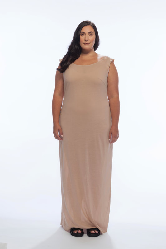 The Scoop Neck Column Dress, in Blush, is pictured from LISA AVIVA's Spring/Summer 21 Collection.